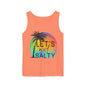 An orange tank top with a graphic design featuring a palm tree and a colorful sunset.