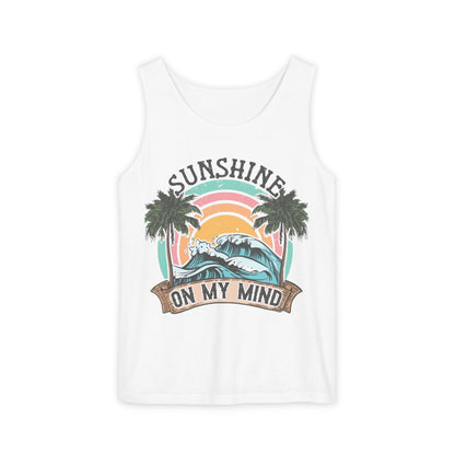 A white tank top with a graphic design featuring a sunset, palm trees, and the text "SUNSHINE ON MY MIND".