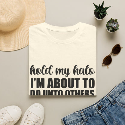 a casual outfit laid out on a flat surface, including a white t-shirt with a humorous text, sunglasses, a hat, and some potted plants.