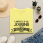 a yellow t-shirt with a humorous text, a pair of sunglasses, a hat, a pair of sneakers, and some potted plants.