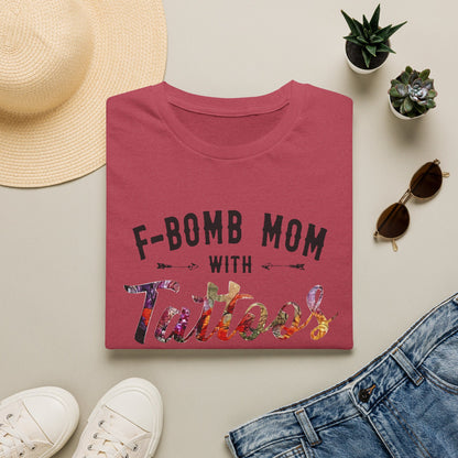 a red t-shirt with the text "F-BOMB MOM WITH Tattoo" printed on it, along with a pair of jeans, sunglasses, and a straw hat.