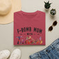 a red t-shirt with the text "F-BOMB MOM WITH Tattoo" printed on it, along with a pair of jeans, sunglasses, and a straw hat.