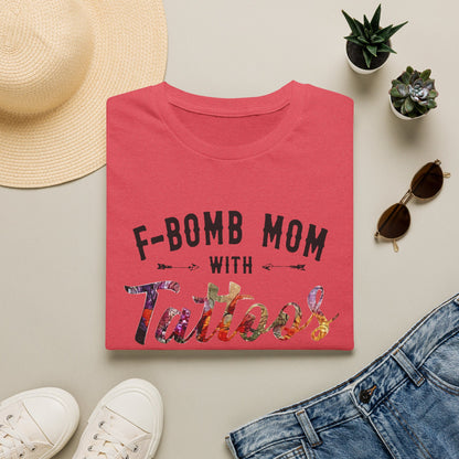 a red t-shirt with the text "F-BOMB MOM WITH Tattoo" printed on it, along with a pair of jeans, sunglasses, and a straw hat.