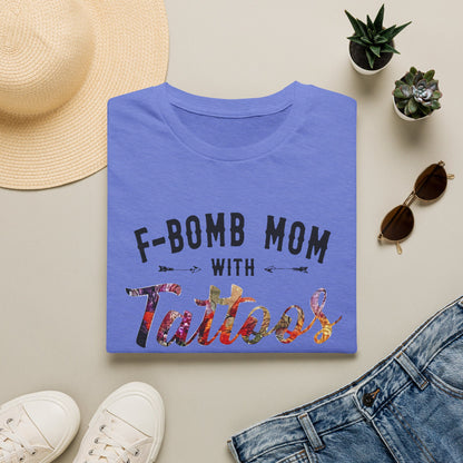 a blue t-shirt with the text "F-BOMB MOM WITH Tattoos" printed on it, along with a pair of jeans and sunglasses.