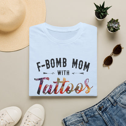 a white t-shirt with the text "F-BOMB MOM WITH TATToos" printed on it, along with a pair of jeans and sunglasses.